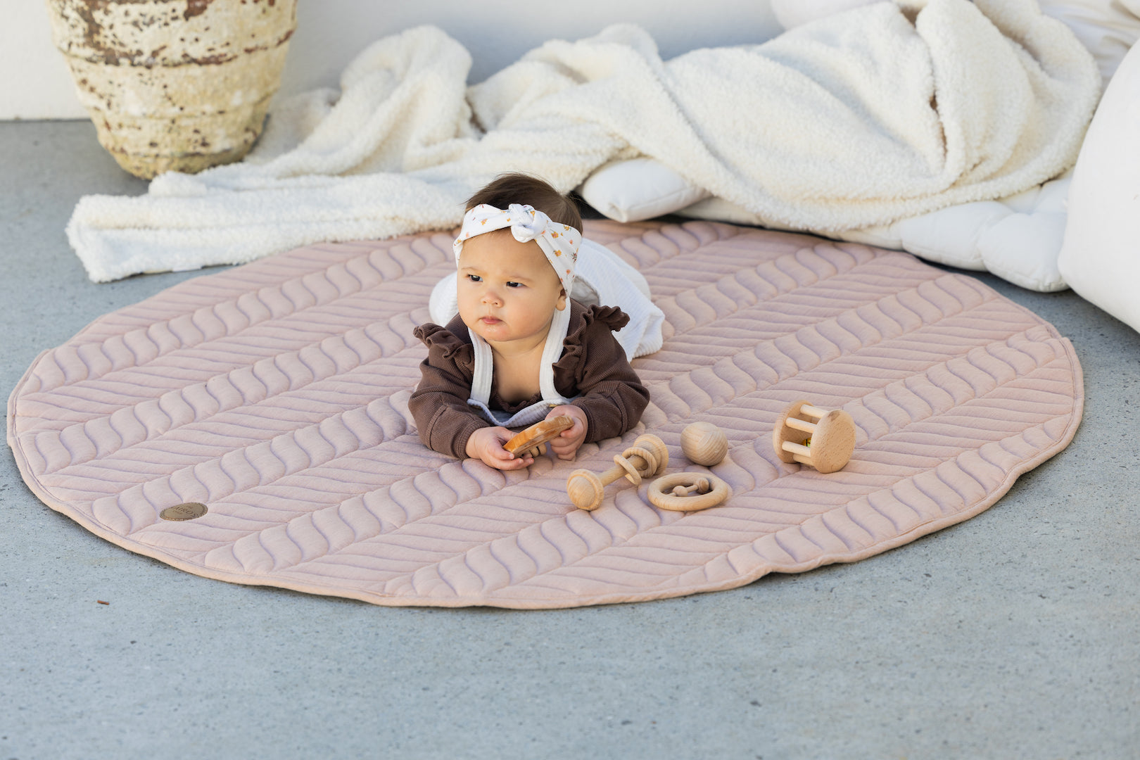 Baby learning to crawl on Kairos Child Pampas Play Mat